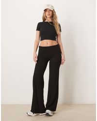 Tala - 365 Sculpting Lounge Multiway Fold Waist Flared Trousers - Lyst