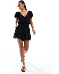 Superdry - Short Sleeve Printed Playsuit - Lyst