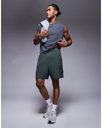 4505 - Icon 7 Inch Quick Dry Training Cargo Shorts With Zip Pockets - Lyst