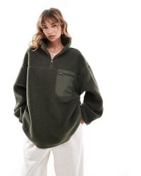 ASOS - Sudadera Polar Con Media Cremallera De Mezcla De Borreguito Y Nailon De -Verde - Lyst
