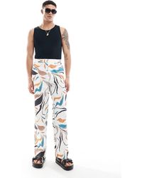 ASOS - Pantalon habillé large en lin mélangé à imprimé fleurs abstrait - Lyst