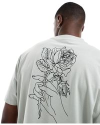 ASOS - T-shirt comoda grigia con stampa di fiore sulla schiena - Lyst