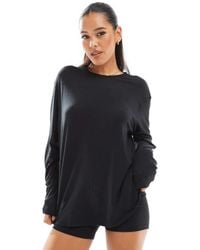 Nike - Camiseta Negra Holgada De Manga Larga Dri-Fit De Nike One Training - Lyst