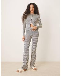 ASOS - Pantalon large d'ensemble en maille à rayures - bleu et jaune - Lyst