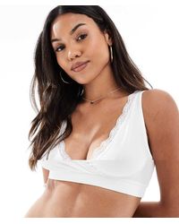 Mama.licious - Pack De 2 Sujetadores De Color Negro Y Blanco De Lactancia Para Dormir Con Ribete De Encaje De Mamalicious Maternity - Lyst