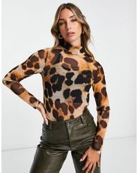 ASOS - Top de manga larga con estampado de leopardo y cuello alto de malla de - Lyst