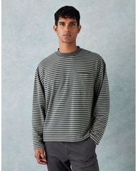 ASOS - T-shirt oversize coupe carrée en tissu épais à rayures fines avec poche et manches longues - vert - Lyst