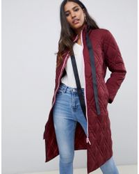 ASOS Chaqueta de plumas larga con cremallera en contraste - Verde