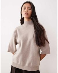 Pretty Lavish - Knitted Roll Neck Cropped Sleeve Jumper - Lyst