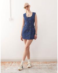 Lioness - Double Button Front Pocket Detail Denim Mini Dress - Lyst