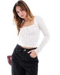 Cotton On - Cotton on - annie - top à manches longues et col v avec liens et dentelle à petites fleurs vintage - Lyst