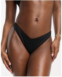 Hollister - Slip bikini sgambato nero a coste con design a v - Lyst