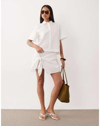 Noughts & Kisses - Linen Blend Wrap Tie Detail Mini Skirt - Lyst