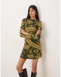 Never Fully Dressed - Gebreide Mini Trui-Jurk Met Print - Lyst