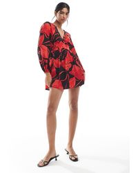 Wednesday's Girl - Bold Bloom V-neck Mini Dress - Lyst