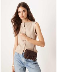Mango - Borsa A Tracolla Intrecciata Cioccolato Con Borchie - Lyst