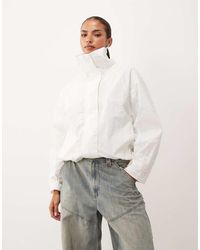 Lioness - Shoreline Funnel Neck Oversized Utility Toggle Windbreaker Jacket - Lyst