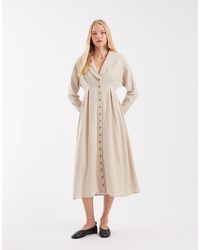 Muse Assembly - Maxikleid mit knopfleiste und besticktem kragen - Lyst