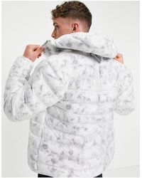 chaqueta nike blanca y negra hombre