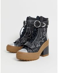 stivali converse alti fino al ginocchio