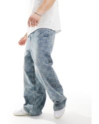 Bershka - Jeans super larghi con motivo jacquard - Lyst