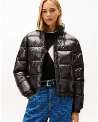 Tommy Hilfiger - – glänzende, packbare pufferjacke - Lyst