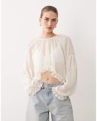 SNDY'S - Chiffon Curved Ruffle Hem Top - Lyst