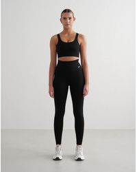 Aim'n - Collant long côtelé sans coutures - Lyst