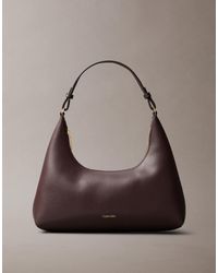 Calvin Klein - Folien-Logo-Schultertasche - Lyst