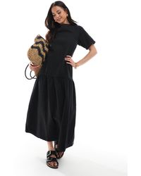 ASOS - Robe t-shirt mi-longue en jean avec taille basse - Lyst