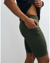 4505 - Icon Active Quick Dry Base Layer Training Half Tight With Phone Pocket - Lyst