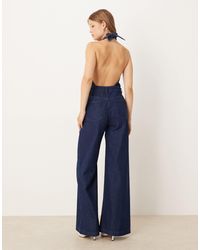 ASOS - Denim Halter Neck Jumpsuit With Wide Leg - Lyst