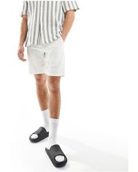 SELECTED - Pantalones cortos blancos - Lyst