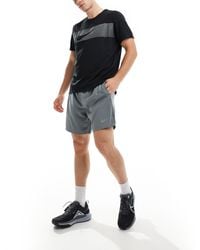Nike - Challenger - short 7 pouces en tissu dri-fit - Lyst
