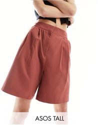 ASOS - Asos design tall - pantaloncini sartoriali taglio lungo ruggine - Lyst