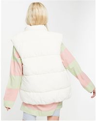 monki amber recycled short padded jacket with hood in blue