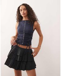 Weekday - Top Sin Mangas Con Ojales Y Lazadas En Los Laterales De - Lyst