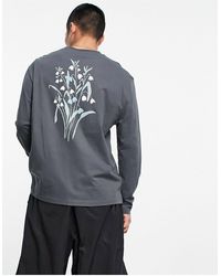ASOS - T-shirt décontracté à manches longues en coton avec imprimé fleurs au dos - anthracite - Lyst