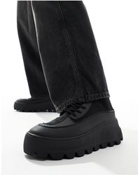 ASOS - Botas negras estilo calcetín con cordones, suela gruesa y detalle - Lyst