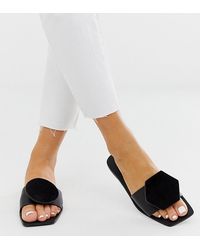 ASOS Flache Sandalen aus feinstem Leder mit weiter Passform - Schwarz