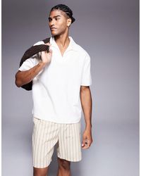 ASOS - Polo coupe carrée décontractée en tissu côtelé texturé avec col à revers - crème - Lyst