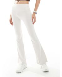 agon® - Flared Leggings - Lyst