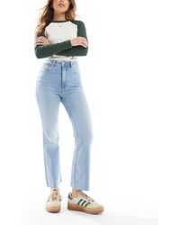 Stradivarius - Cropped Flared Jeans Met Hoge Taille - Lyst