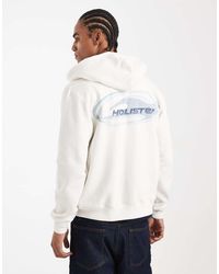 Hollister - Zip Up Hoodie With Back Logo Graphic Detail - Lyst