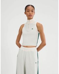 Ellesse - Surista 1/4 Zip Top - Lyst