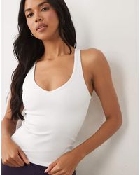 4505 - Active V-Neck Racer Back Vest With Inner Bra - Lyst