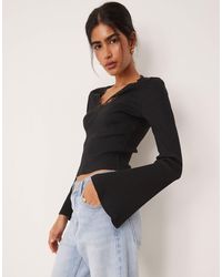 ASOS - Rib V Neck Top With Lace Trim And Flared Sleeve - Lyst