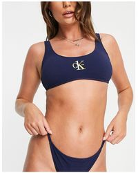 Calvin Klein - Top bikini corto color - Lyst
