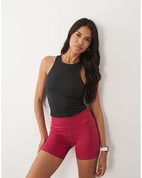 4505 - Icon Racer Back Tank Top With Inner Bra And Removable Padding - Lyst