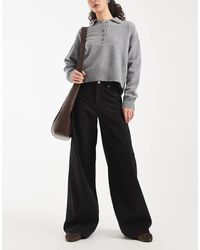 Vero Moda - Vaqueros Negros De Talle Medio Y Pernera Ancha Remy De - Lyst